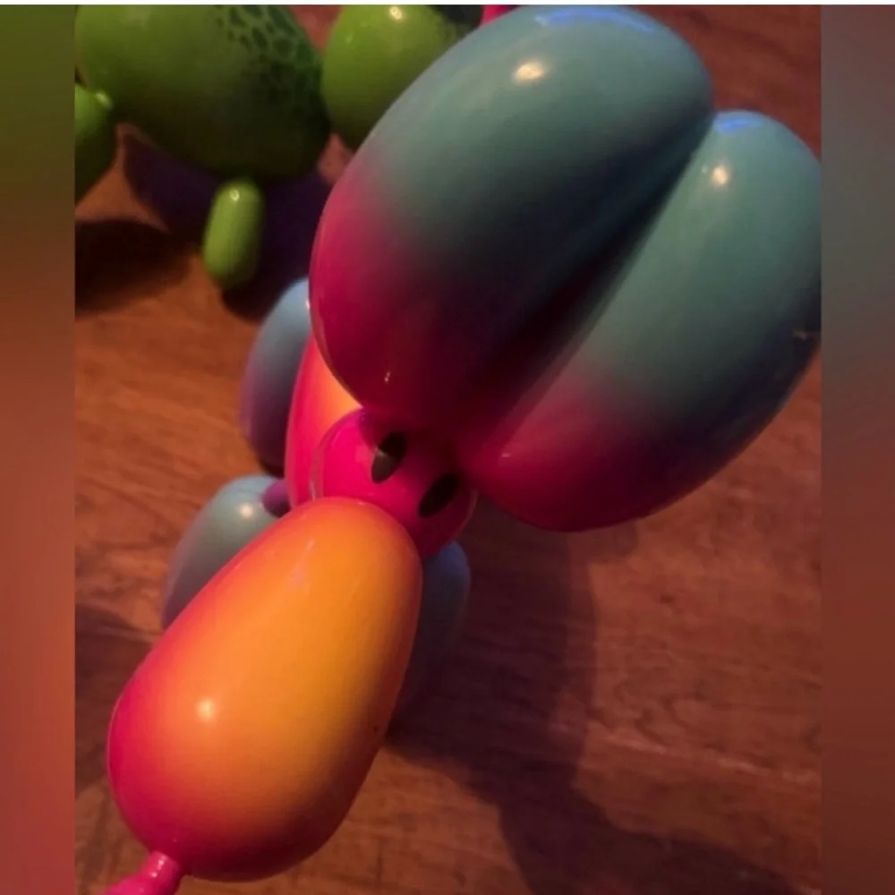 Squeakies interactive balloon animal rainbow dog